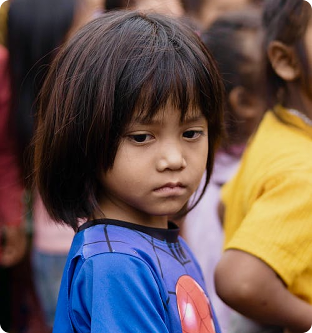 A child representing the people supported through The Give Collective campaigns